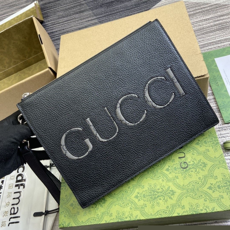 G*u*i clutch bags